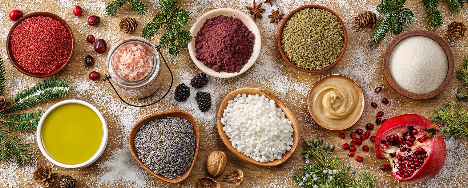 Pictured is a Festive, Holiday Themed Selection of Our Wide Range of Premium Bulk Ingredients for Professional Personal Care Manufacturers